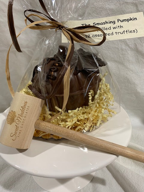 Smashing Pumpkin with Wooden Mallet